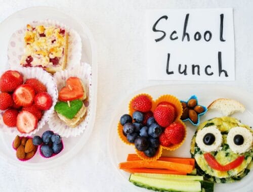 Fresh school lunch with colorful fruits, vegetables, and fun food shapes, promoting healthy eating habits for kids. Perfect for parents looking for nutritious meal ideas for children.