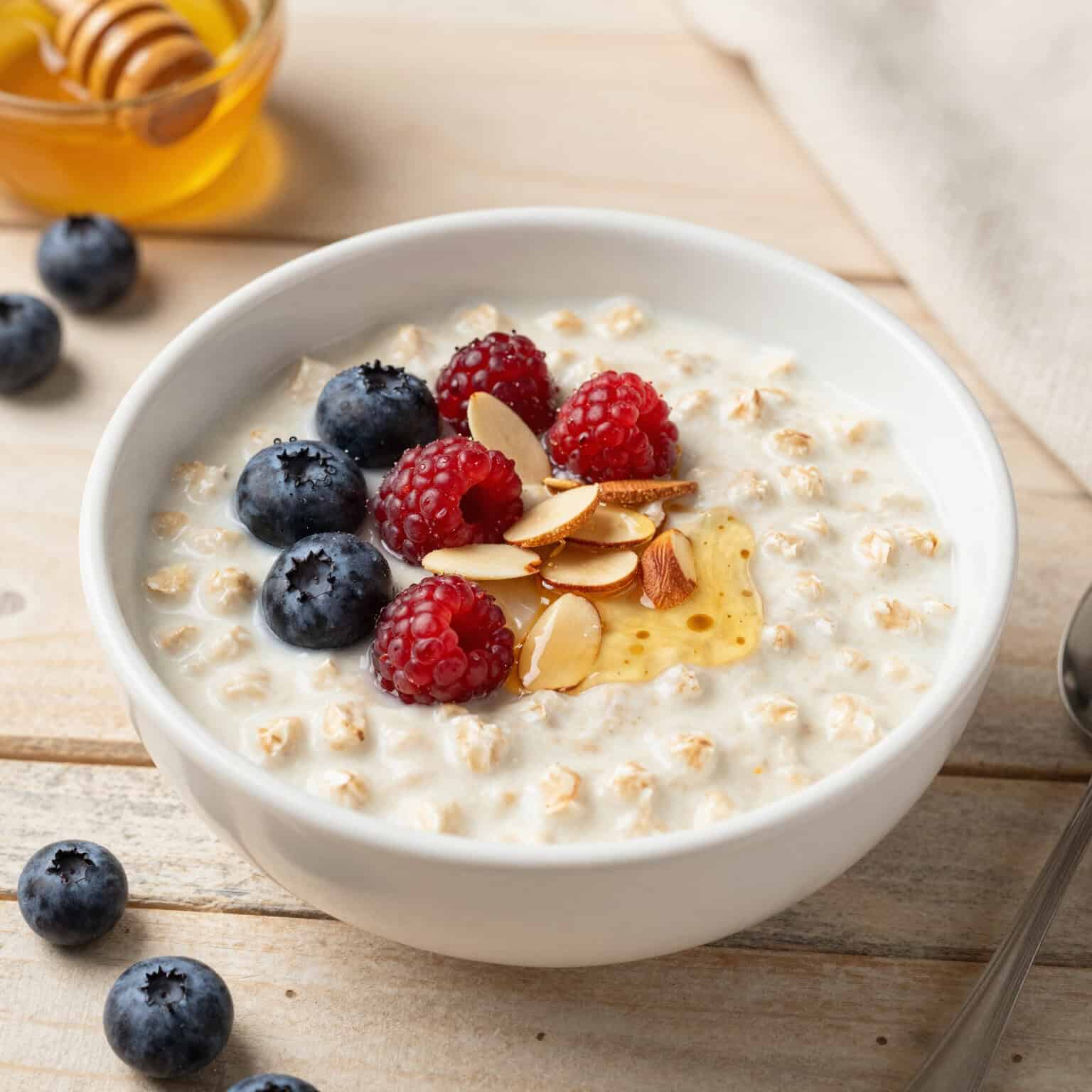 Oatmeal topped with berries and honey