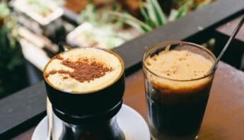 Rich coffee beverages with creamy toppings and frothy texture, perfect for a relaxing moment or morning boost. Ideal for coffee lovers seeking energizing drinks with indulgent flavor.
