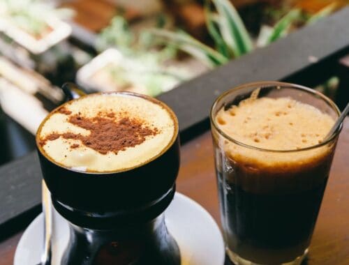 Rich coffee beverages with creamy toppings and frothy texture, perfect for a relaxing moment or morning boost. Ideal for coffee lovers seeking energizing drinks with indulgent flavor.
