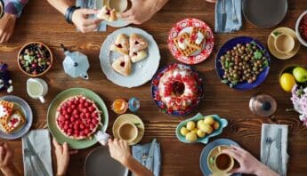 Sweet Escapes: 10 Irresistible Mediterranean Desserts List You Must Try! 13 Sugar-free fruit desserts and healthy snacks on a colorful dining table for a nutritious lifestyle.