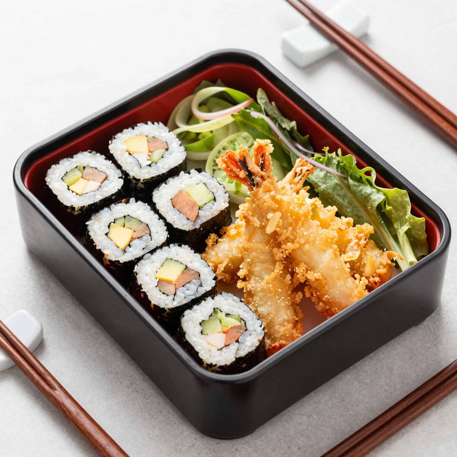 Sushi and tempura in bento box