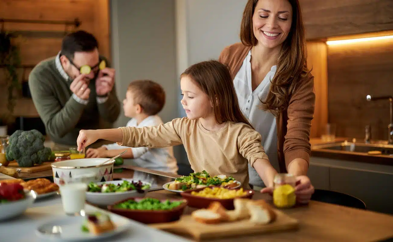 Healthy family enjoying a nutritious meal together at home, emphasizing balanced eating and wellness.