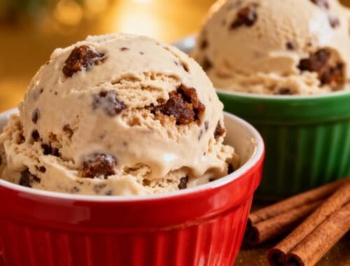 Rich, vanilla ice cream with chocolate chips served in colorful bowls, perfect for a sweet treat or dessert. Accented by cinnamon sticks and a golden background, evoking comfort and indulgence.